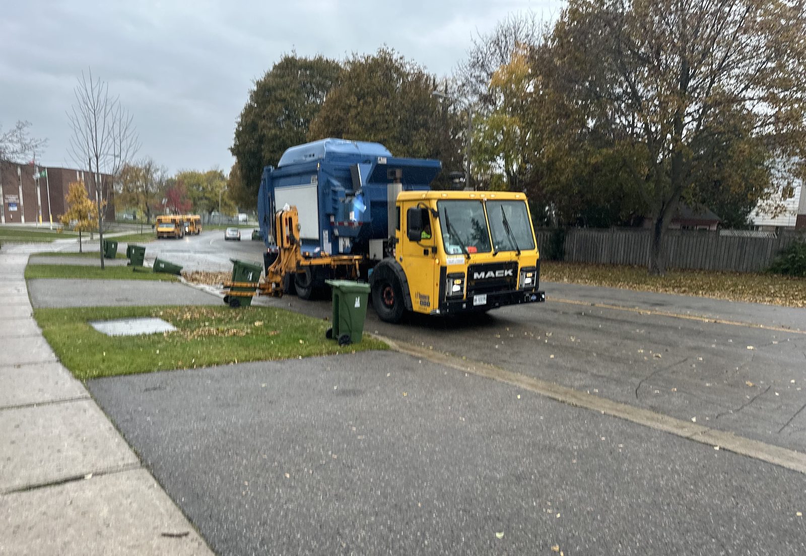 Waste collection truck and bins
