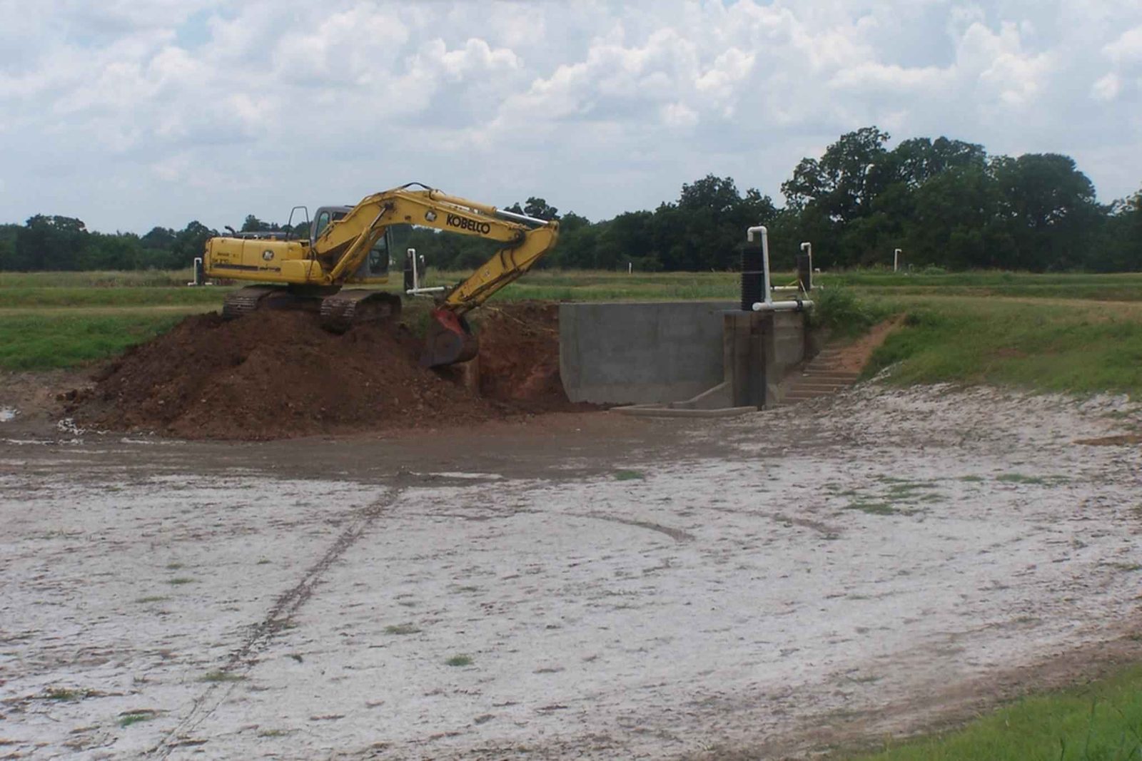Excavator performing earthworks